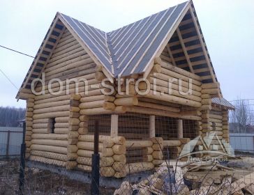 Дом по проекту Сруб-22 из бревна ручной рубки