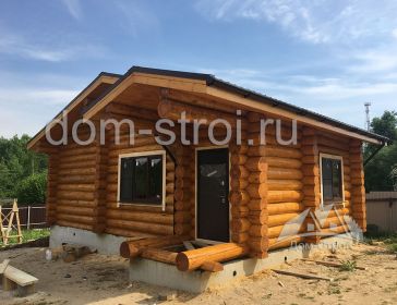 Баня из бревна ручной рубки с внешней отделкой